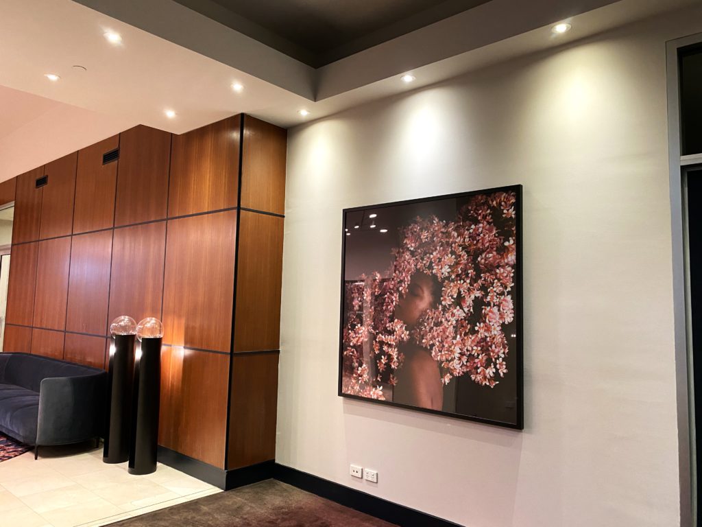 Melbourne street-art prints in the lobby of Adina Apartments on Flinders, Melbourne