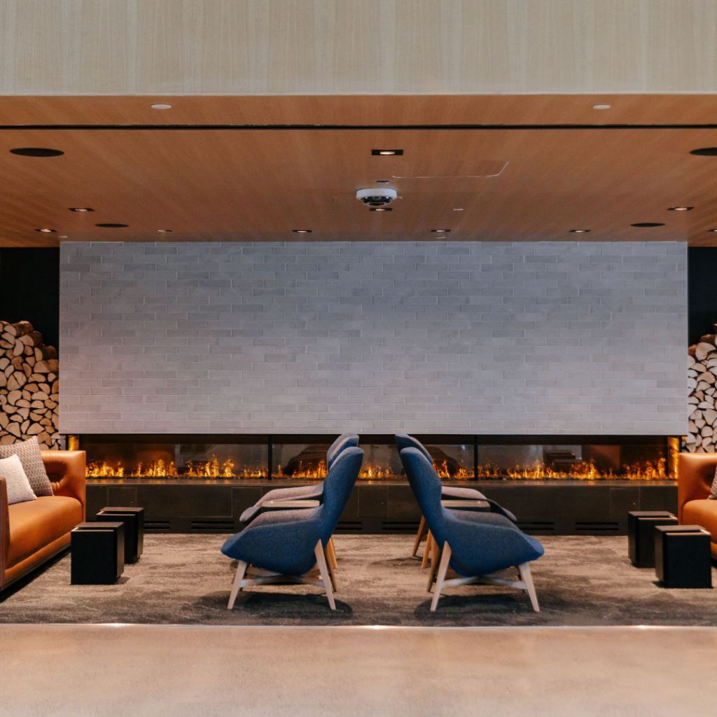 Grand fireplace at United Club at Denver International Airport