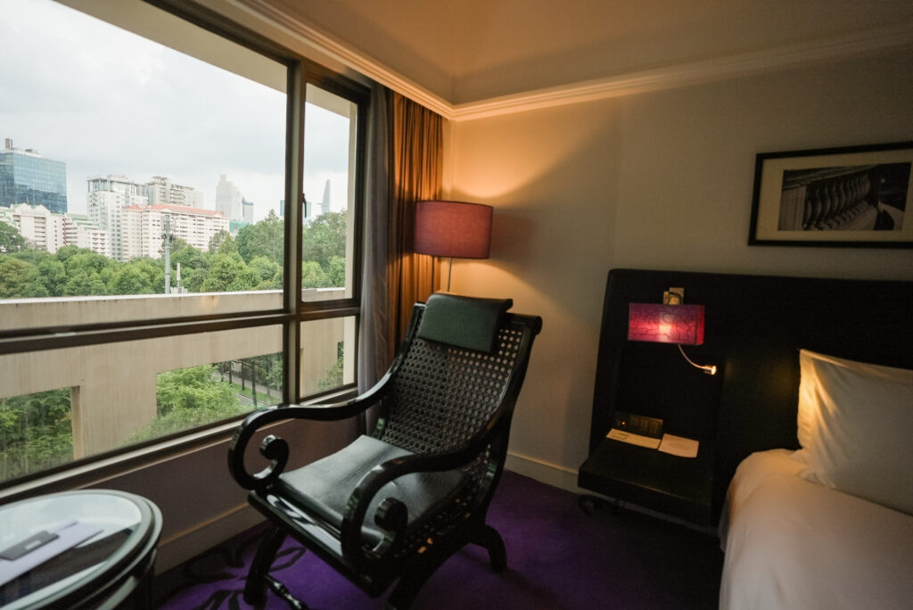 Indo Chine style chair in the room at Sofitel Saigon Plaza
