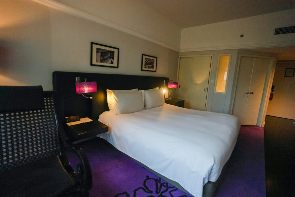 King bed in Superior room at Sofitel Saigon Plaza