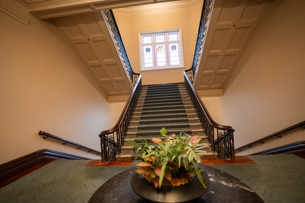 Grand staircase at Adina Heritage Christchurch